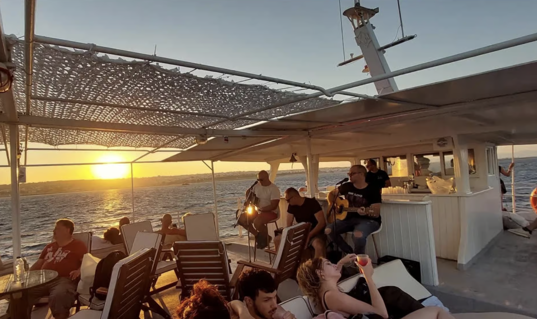 Rhodes: Sunset Cruise with Live Music, Wine & Greek Buffet